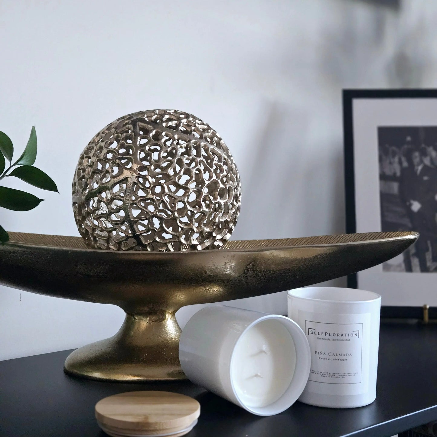 pineapple coconut scented candle in sleek white glossy jar