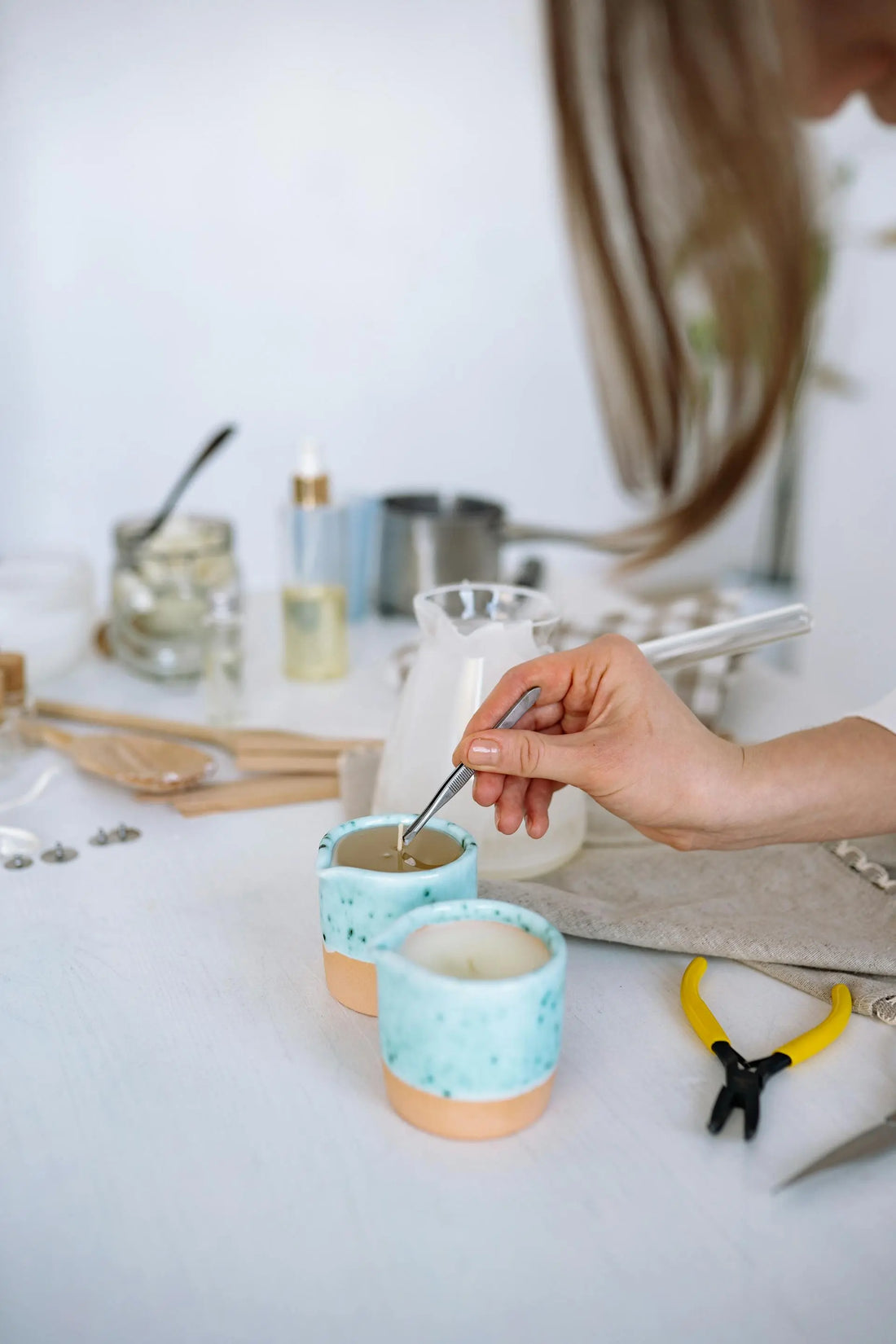 Candle care by trimming wick